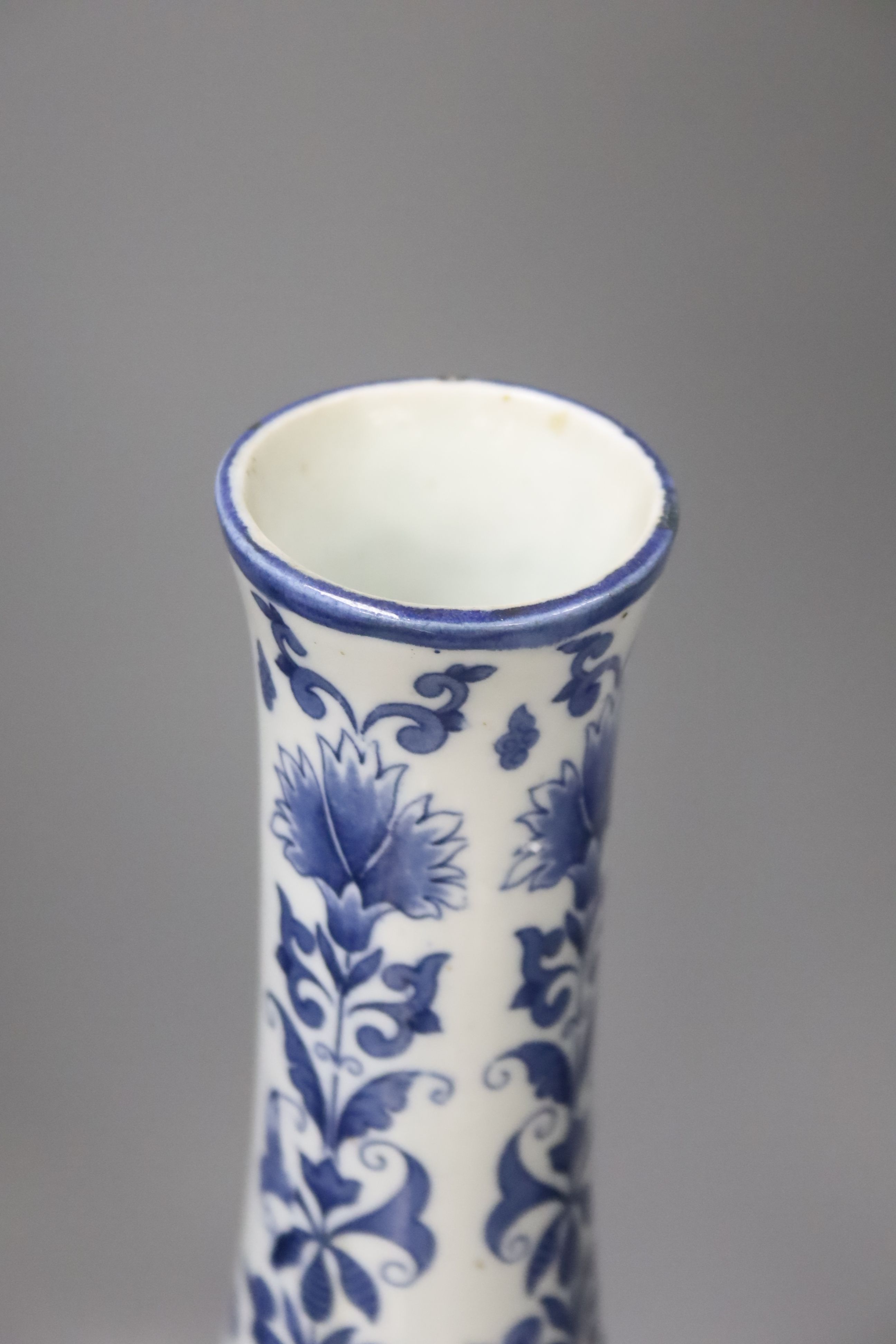 A Dutch porcelain blue and white long necked bottle vase